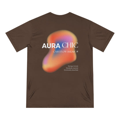 Back view of walnut brown organic cotton t-shirt featuring the Aura Chic Cash Flow Weak design with a soft iridescent gradient in peach, violet, and gold hues. Text reads “AURA CHIC — Cash Flow Weak” and “Savings minimal. Standards maximal. Emotionally diversified.” from Office Off-Duty.