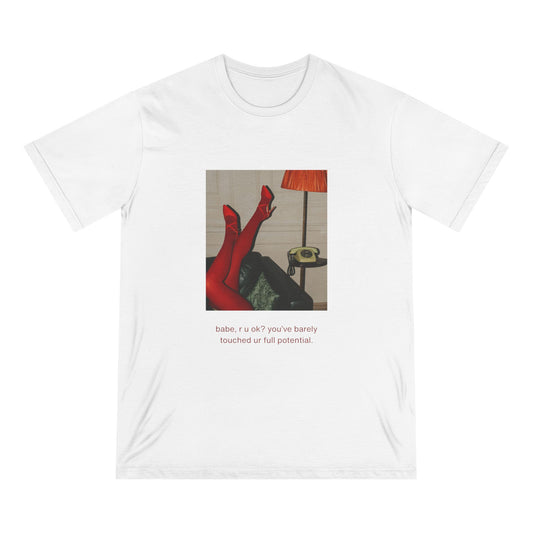 Front view of white organic cotton graphic t-shirt featuring retro photograph of crossed red legs with vintage decor and text that reads “babe, r u ok? you’ve barely touched ur full potential.” Minimalist and witty Office Off-Duty design.