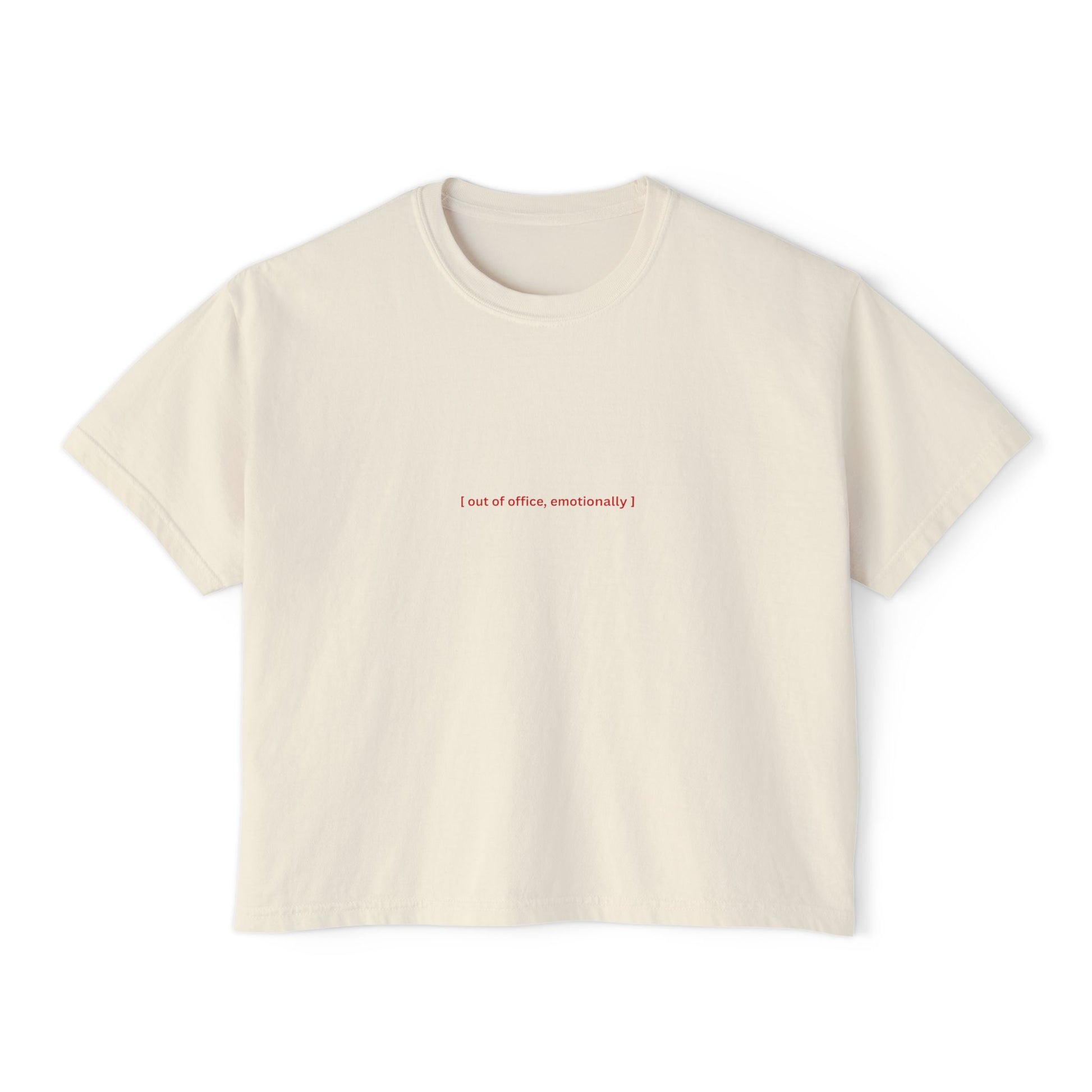 Front view of the “Out of Office, Emotionally” cropped tee by Office Off-Duty in ivory. A soft 100% cotton relaxed-fit crop with minimalist red text centered on the chest — quietly sarcastic and burnout-coded.